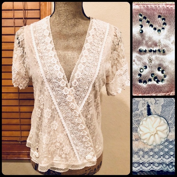 213 Tops - Super feminine lace wrap shirt. Hangs really well.